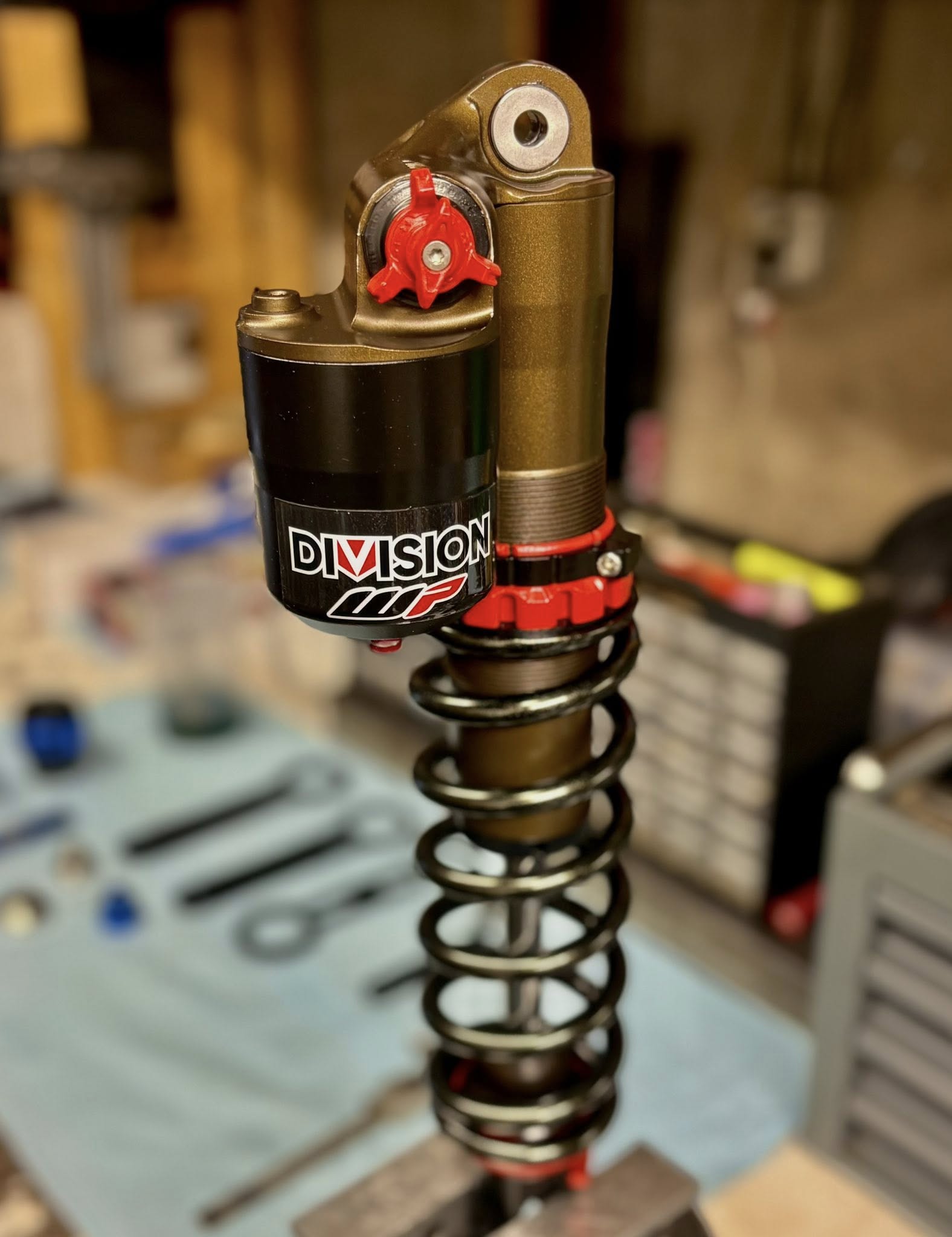 Motorcycle shock being serviced